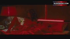 Violante Placido Shows Boobs in Bed – The American