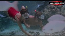 2. Rachel Ward in Red Swimsuit – Against All Odds