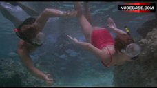 3. Rachel Ward in Red Swimsuit – Against All Odds