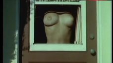 2. June Wilkinson Shows Nude Tits in Window  – The Immoral Mr. Teas