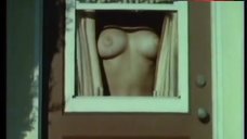 4. June Wilkinson Shows Nude Tits in Window  – The Immoral Mr. Teas