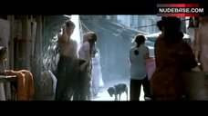 2. Michelle Yeoh in Wet T-Shirt – Tomorrow Never Dies