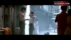 4. Michelle Yeoh in Wet T-Shirt – Tomorrow Never Dies
