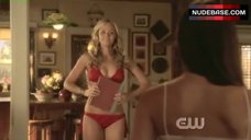 5. Laura Vandervoort Sexy in Red Bikini – Smallville