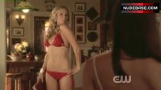 6. Laura Vandervoort Sexy in Red Bikini – Smallville