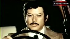 10. Erika Blanc Shows Boobs – The Deadly Triangle