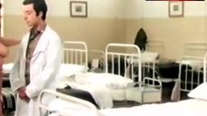 7. Edwige Fenech Shows Breasts in Hospital – La Dottoressa Del Distretto Militare