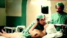 4. Edwige Fenech Shows Tits and Ass on Operating Table – La Dottoressa Del Distretto Militare
