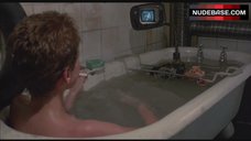 4. Kim Greist Lying Nude in Bathtub – Brazil