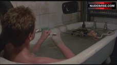 7. Kim Greist Lying Nude in Bathtub – Brazil