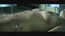 2. Lauren Hood Nude in Morgue – The Killing Gene