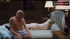 3. Emily Browning Lying Nude on Bed – Sleeping Beauty