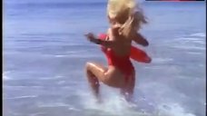 5. Pamela Anderson in Red Swimsuit – Baywatch