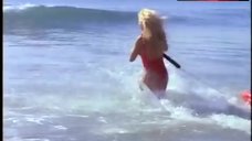6. Pamela Anderson in Red Swimsuit – Baywatch