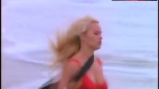 5. Pamela Anderson Rans in Swimsuit – Baywatch