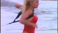 6. Pamela Anderson Rans in Swimsuit – Baywatch