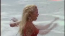 9. Pamela Anderson Rans in Swimsuit – Baywatch