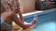 2. Pamela Anderson in Bikini near Pool – V.I.P.