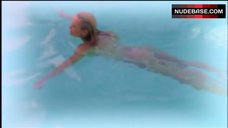 5. Pamela Anderson Floats in Mini-Bikini – V.I.P.
