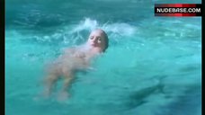 8. Ursula Andress Swimming in Poll Full Nude – The Sensuous Nurse