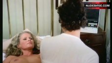 2. Ursula Andress Shows Lying in Bed Naked – The Sensuous Nurse