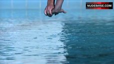 1. Sabrina Machado Swims in Pool Topless – Never Surrender