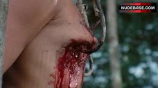 7. Zora Kerova Breasts Scene – Cannibal Ferox