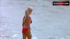 6. Madeleine West in Red Bikini – You And Your Stupid Mate