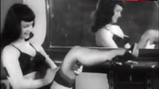 8. Bettie Page in Sexy Black Underwear – Teaser Girl In High Heels