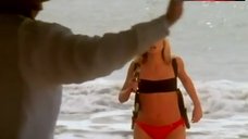 6. Jennifer Sky in Bikini on Beach – Never Die Alone