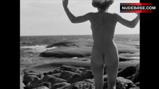 8. Harriet Andersson Naked on Beach – Summer With Monika