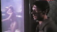 10. Hanna Schygulla Flashes Boobs and Pussy – Warszawa