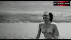 3. Anne Brochet Nude on Beach – Dust