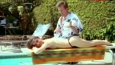 5. Brinke Stevens Flashes Breasts – Bad Girls From Mars