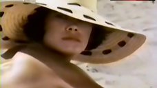 7. Demetra Hampton Topless on Beach – Valentina