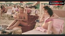 4. Martina Gedeck Sexy in Pink Swimsuit – Frauen Lugen Nicht