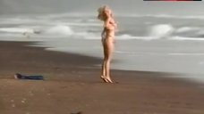 1. Rosanna Arquette Topless on Beach – The Wrong Man