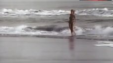 10. Rosanna Arquette Topless on Beach – The Wrong Man