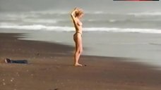 2. Rosanna Arquette Topless on Beach – The Wrong Man