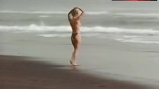 7. Rosanna Arquette Topless on Beach – The Wrong Man