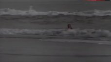 8. Rosanna Arquette Topless on Beach – The Wrong Man