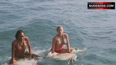 7. Sasha Jackson Ride on Surfboard in Bikini – Blue Crush 2