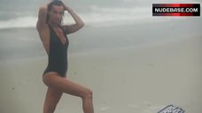 8. Irina Shayk Sexy in Black Swimsuit – Love Advent Calendar Shoot