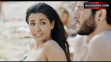 2. Inma Cuesta Shows Breasts on Beach – Cousinhood