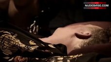 6. Sari Cummings Exposed Breasts – Dragon Eyes