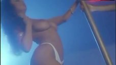 8. Lorissa Mccomas Topless Striptease – Undercurrent