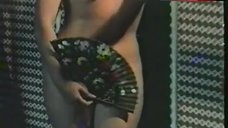 9. Femi Benussi Topless with Fan – La Collegiale