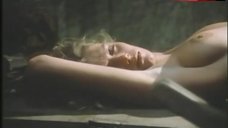 Lana Clarkson Lying Topless on Table – Barbarian Queen Ii