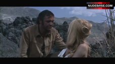 6. Brigitte Bardot Covers Nude Breasts – Shalako