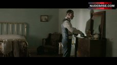 10. Malinda Baker Nude Sittinng on Bed – Lawless